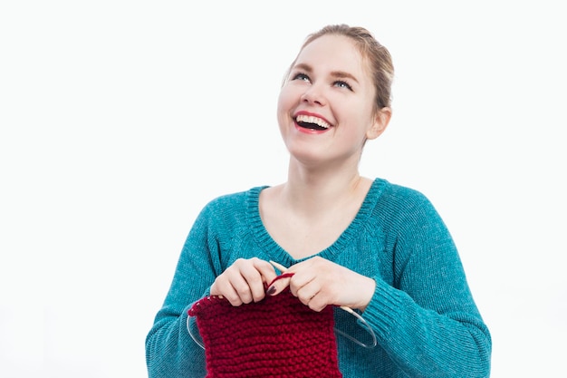 person holding embroidered hoop